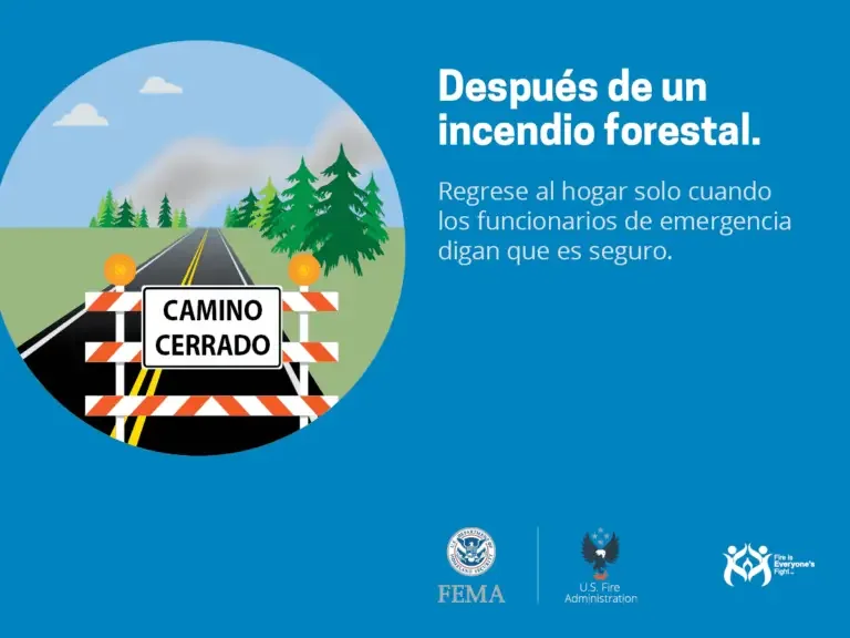 Road closure after a forest fire: only return home when emergency officials declare it's safe.